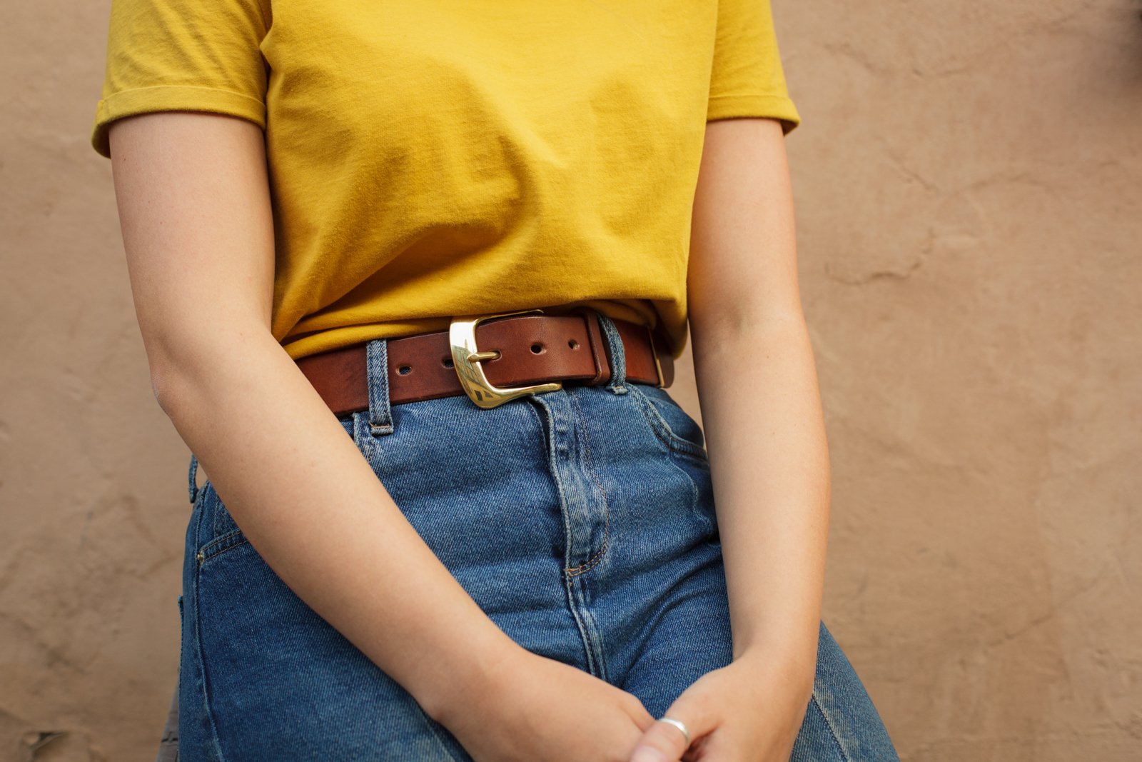 Hand crafted hand stitched dark stain dark brown english bridle leather belt with solid brass swelled front westend english buckle luxury goods heirloom